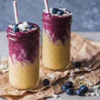 This lovely Mango Blueberry Smoothie uses frozen mango and blueberries and is perfect to maximize your nutrient intake in winter. | Vibrant Plate