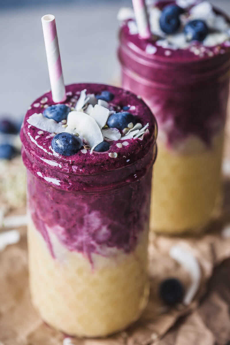 This lovely Mango Blueberry Smoothie uses frozen mango and blueberries and is perfect to maximize your nutrient intake in winter. | Vibrant Plate