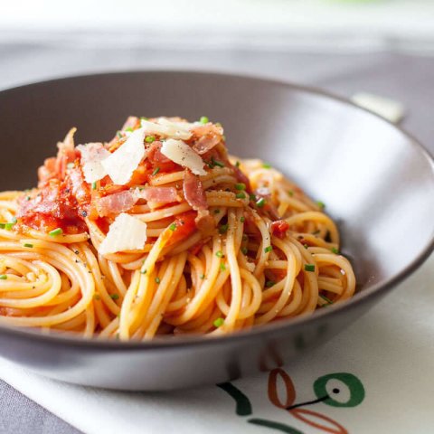 Spaghetti in Tomato Sauce with Bacon - Vibrant plate