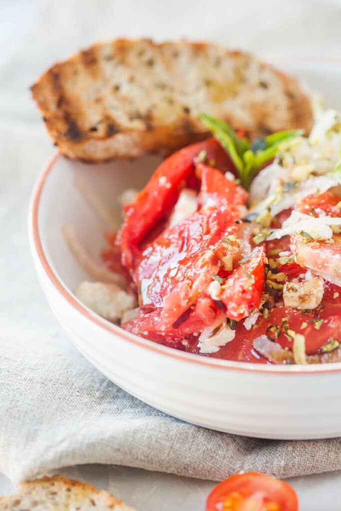 Tomato Salad with Feta Cheese, Onion and Pumpkin Seed Oil | www.vibrantplate.com