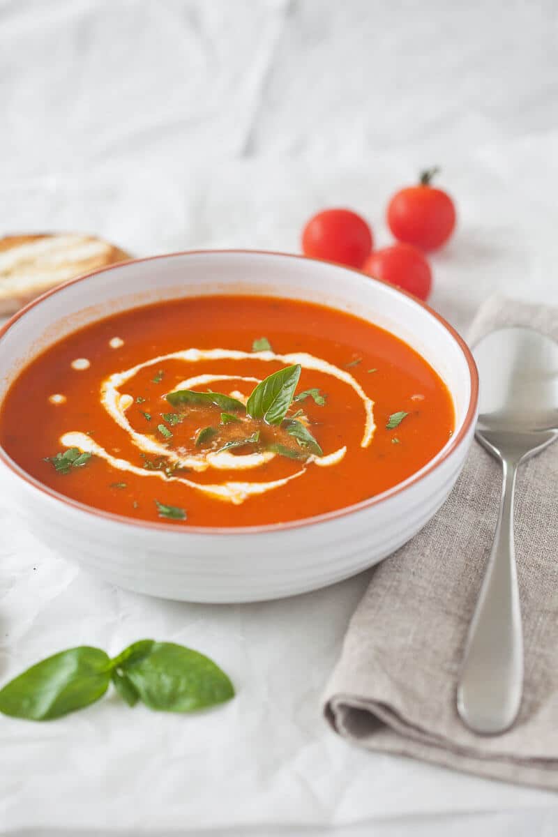 Simply amazing Tomato Soup from Fresh Ripe Tomatoes is delicious. Just 15 minutes and a couple of ingredients to make it, quick & easy! | www.vibrantplate.com