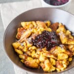 Kaiserschmarrn is a breakfast favorite shredded pancake. Light and fluffy you can also enjoy it for dinner! | www.vibrantplate.com