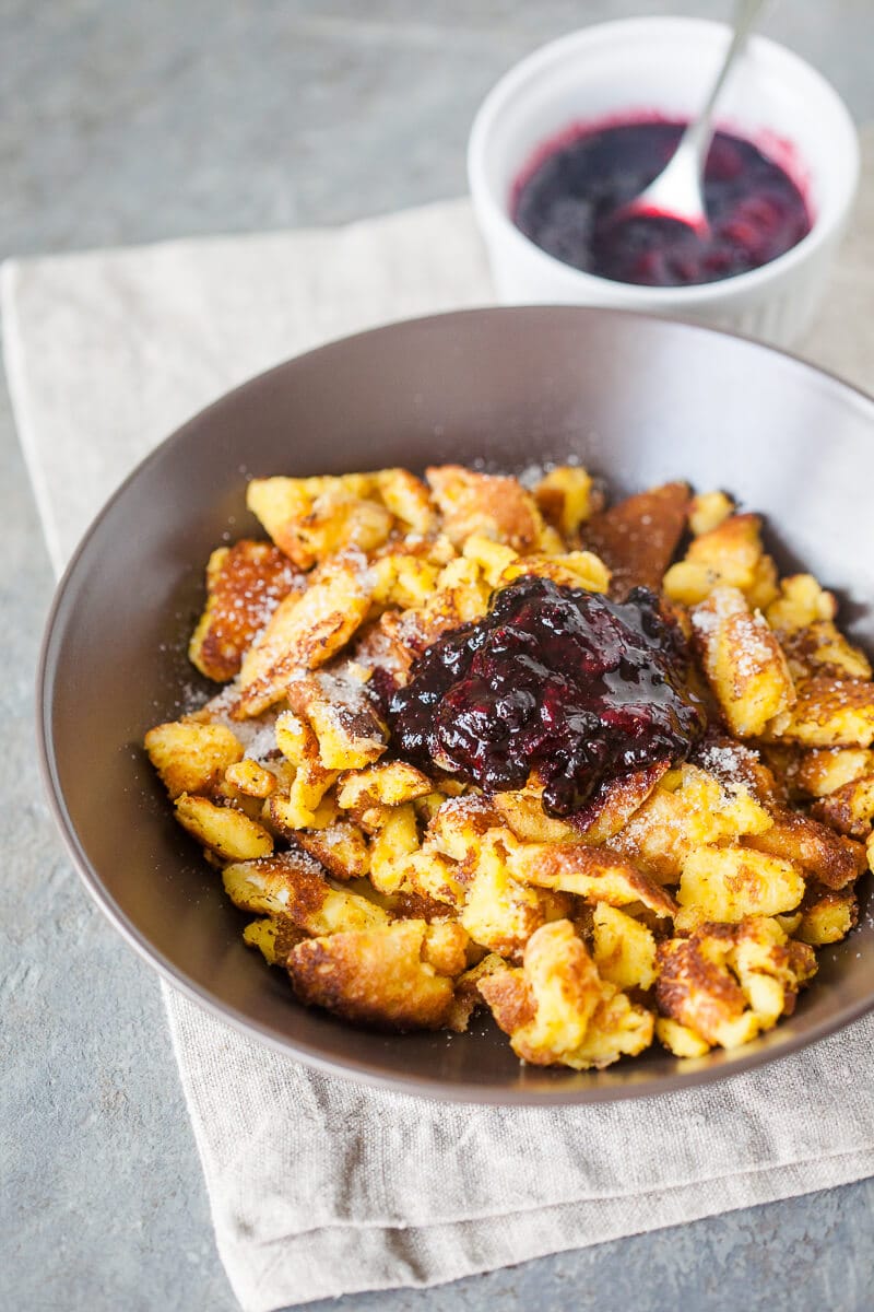 Kaiserschmarrn is a breakfast favorite shredded pancake. Light and fluffy you can also enjoy it for dinner! | www.vibrantplate.com