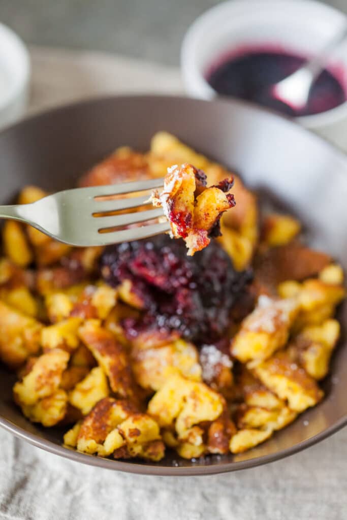 Kaiserschmarrn is a breakfast favorite shredded pancake. Light and fluffy you can also enjoy it for dinner! | www.vibrantplate.com