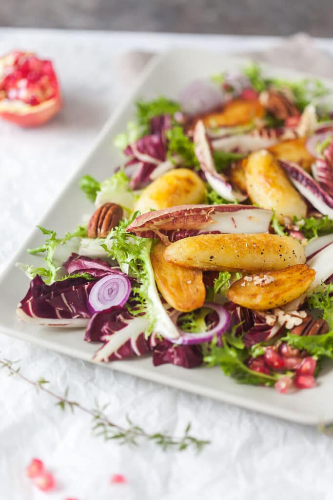 This Radicchio salad with Roasted Potatoes is ideal for colder months. Add Curly Endive for a pop of color! | www.vibrantplate.com