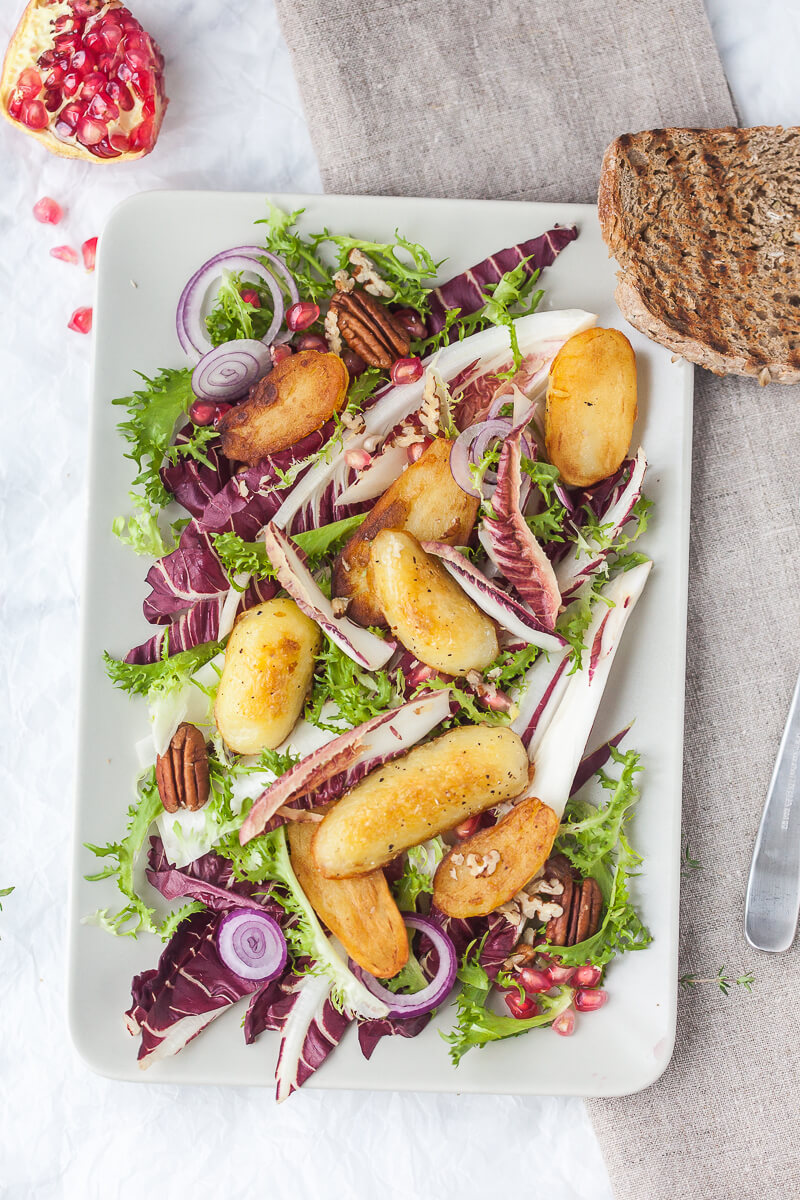 This Radicchio salad with Roasted Potatoes is ideal for colder months. Add Curly Endive for a pop of color! | www.vibrantplate.com