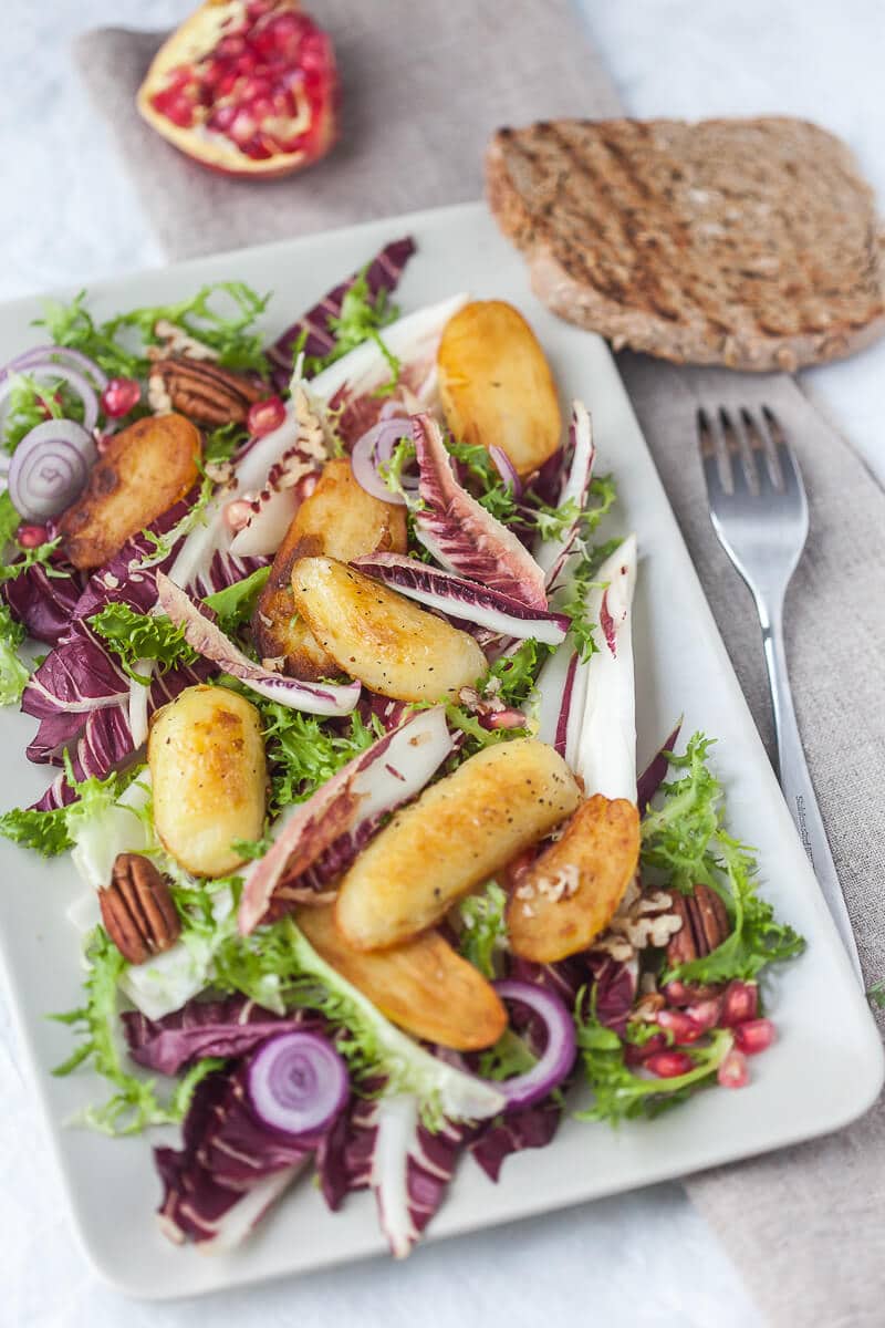 This Radicchio salad with Roasted Potatoes is ideal for colder months. Add Curly Endive for a pop of color! | www.vibrantplate.com