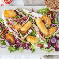 This Radicchio salad with Roasted Potatoes is ideal for colder months. Add Curly Endive for a pop of color! | www.vibrantplate.com