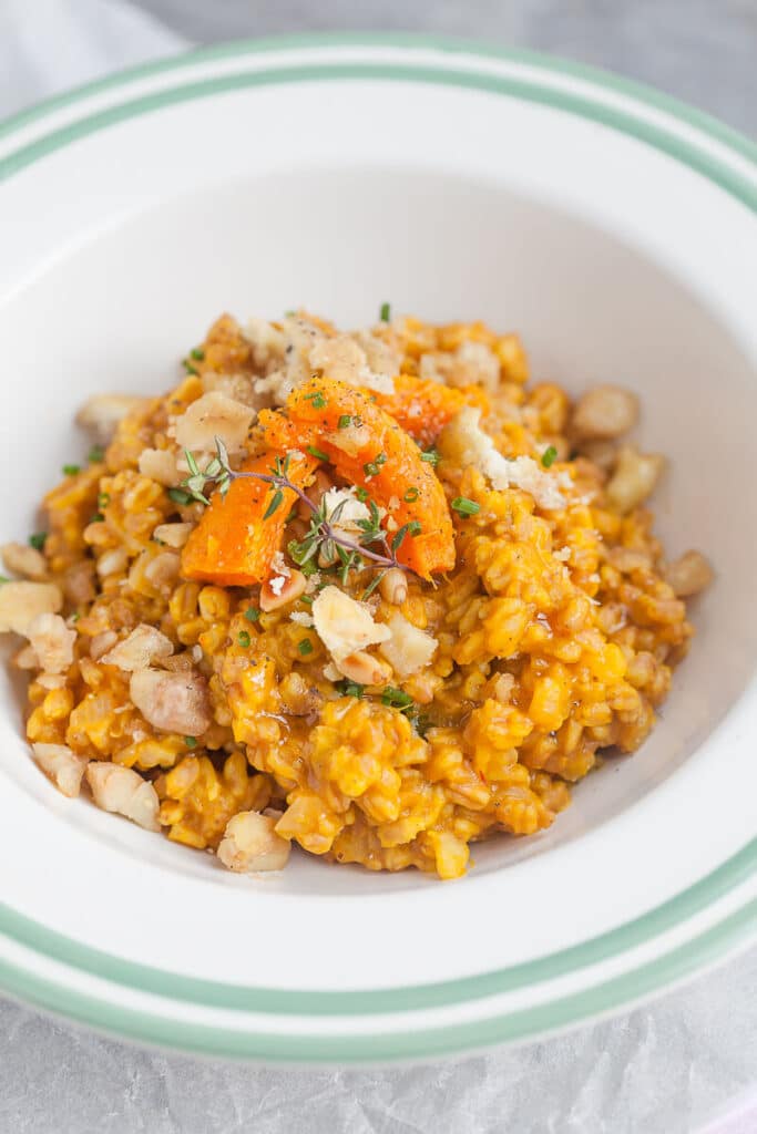 Farro Risotto is a healthier alternative to rice and goes well with fall vegetables. Top with roasted chestnuts for extra flavor! | www.vibrantplate.com