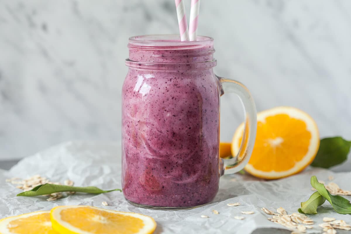 Orange & Blueberry ImmunoBoost Smoothie is packed with vitamins for a healthy winter. Get your vitamins in just 5 minutes! | www.vibrantplate.com