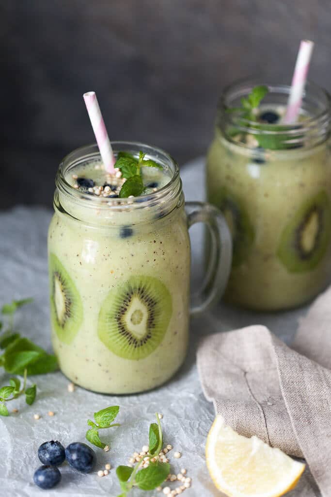 This Kiwi Banana Smoothie with Blueberries looks almost like Spring! Just a couple of minutes and a few ingredients to make. | www.vibrantplate.com