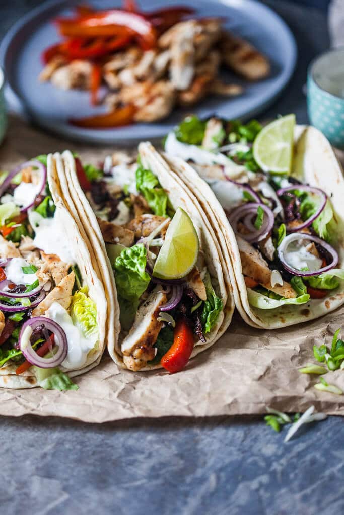 Grilled Chicken Tacos are a healthy and easy meal for every day. Also an excellent to-go meal for the office and a real crowd-pleaser! | www.vibrantplate.com