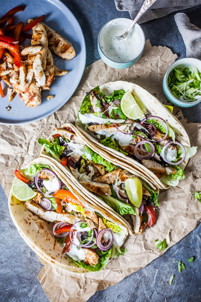 Grilled Chicken Tacos are a healthy and easy meal for every day. Also an excellent to-go meal for the office and a real crowd-pleaser! | www.vibrantplate.com