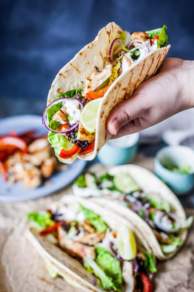 Grilled Chicken Tacos are a healthy and easy meal for every day. Also an excellent to-go meal for the office and a real crowd-pleaser! | www.vibrantplate.com
