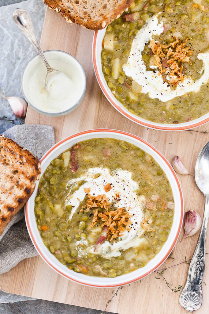 This Split Pea Minestrone Soup is a rustic winter comfort food that will warm you up on a cold day. Skip bacon for a vegetarian option! | www.vibrantplate.com