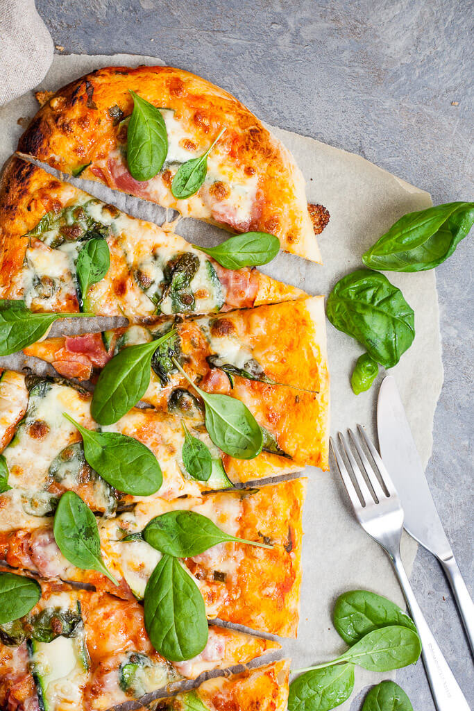 This delicious Spinach & Zucchini Spelt Flour Pizza is made with spelt flour, ham, zucchini and spinach for a healthier pizza option. | www.vibrantplate.com