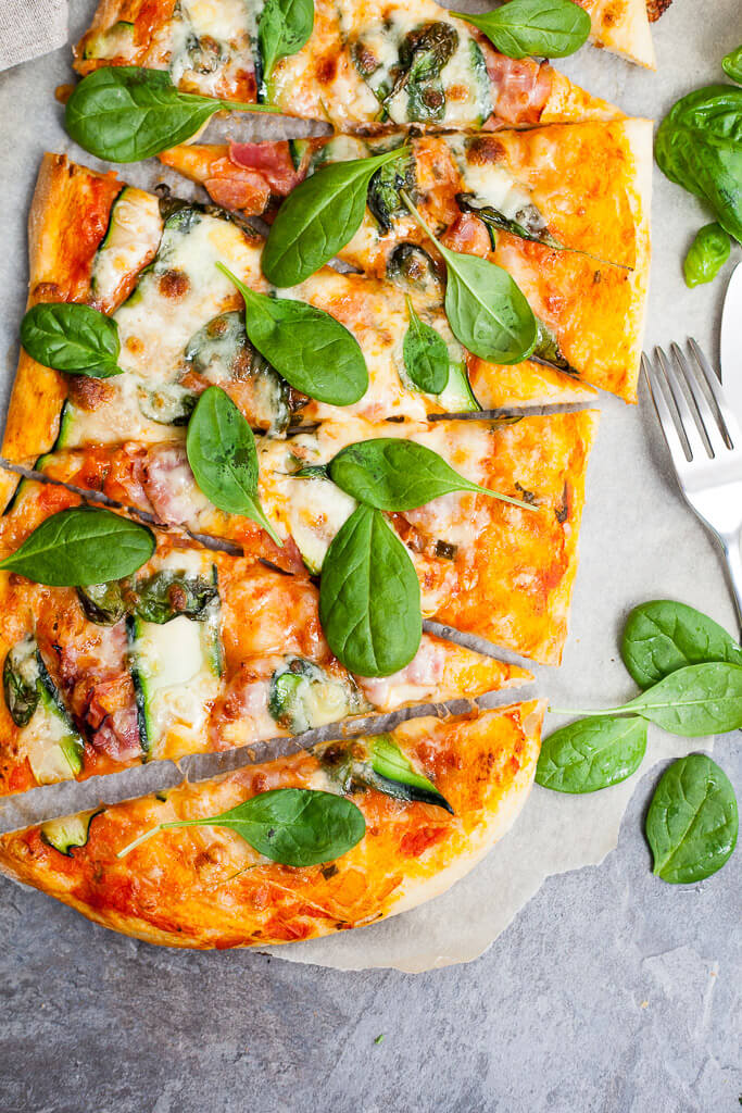 This delicious Spinach & Zucchini Spelt Flour Pizza is made with spelt flour, ham, zucchini and spinach for a healthier pizza option. | www.vibrantplate.com