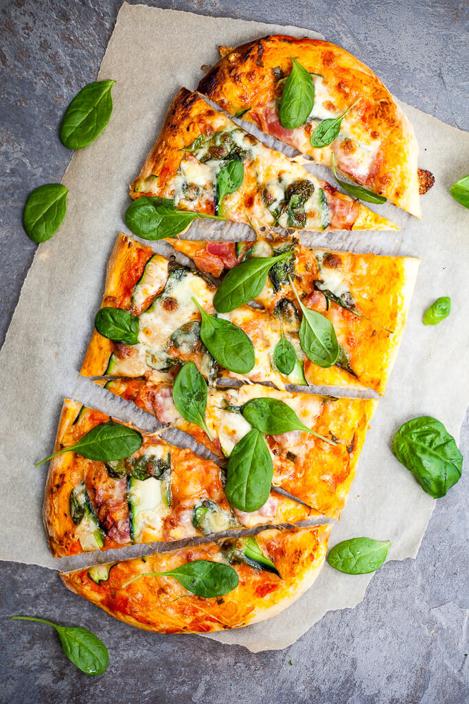 This delicious Spinach & Zucchini Spelt Flour Pizza is made with spelt flour, ham, zucchini and spinach for a healthier pizza option. | www.vibrantplate.com