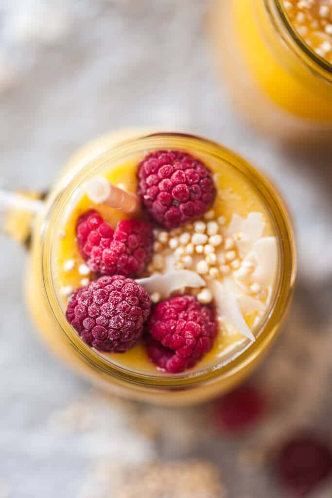 This lovely Pineapple Mango Smoothie is delicious, creamy and sugar-free! | www.vibrantplate.com