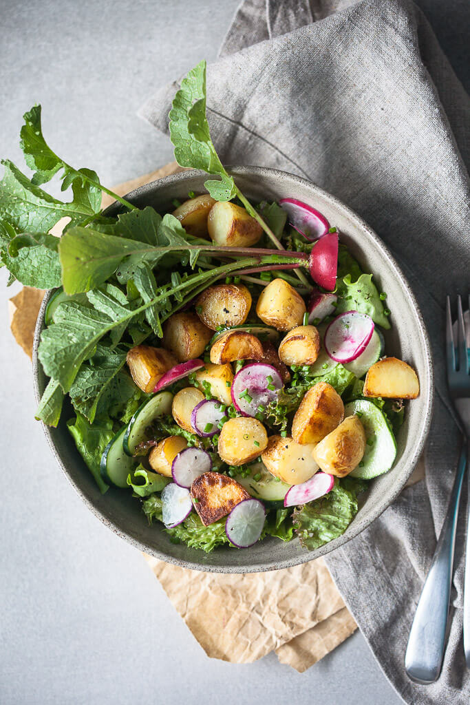 A simple vegan Spring Potato Salad with a delicious Balsamic Vinaigrette, the perfect use of new potatoes! | www.vibrantplate.com