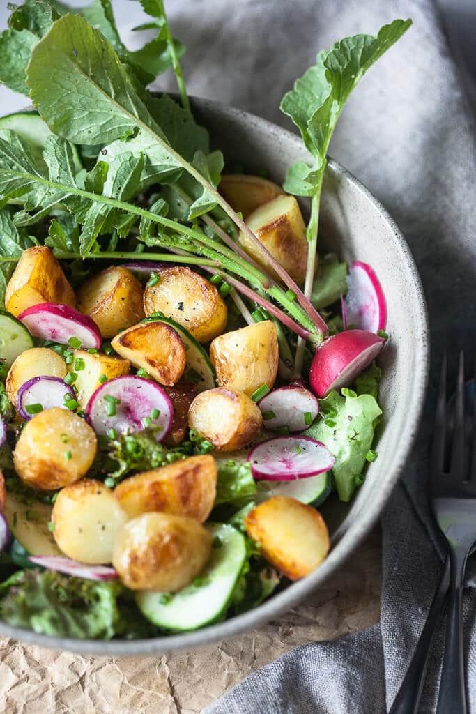 A simple vegan Spring Potato Salad with a delicious Balsamic Vinaigrette, the perfect use of new potatoes! | www.vibrantplate.com