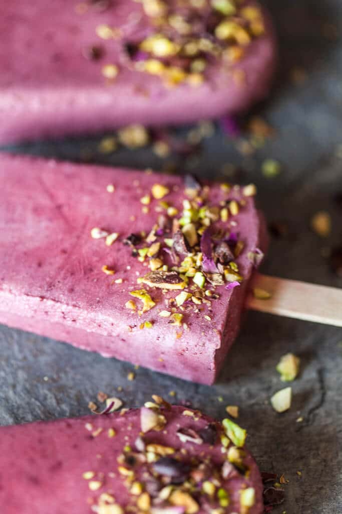 These Wild Strawberries Coconut Milk Popsicles are light, delicious and a real summer treat. Vegan and gluten-free! | www.vibrantplate.com