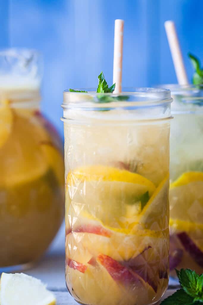 Summer Peach Lemonade has no added sugars and is the perfect drink to keep you cool this summer. | www.vibrantplate.com