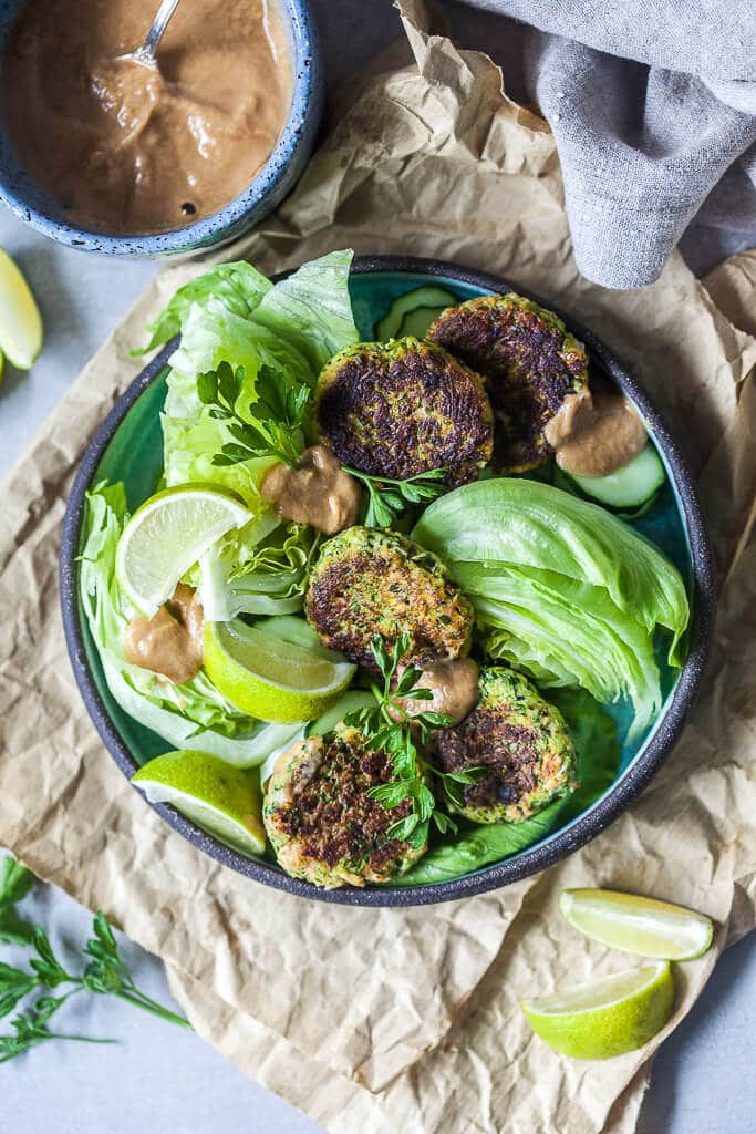 Tofu Zucchini Fritters with Peanut Sauce is the perfect way to use up all those zucchinis. | www.vibrantplate.com