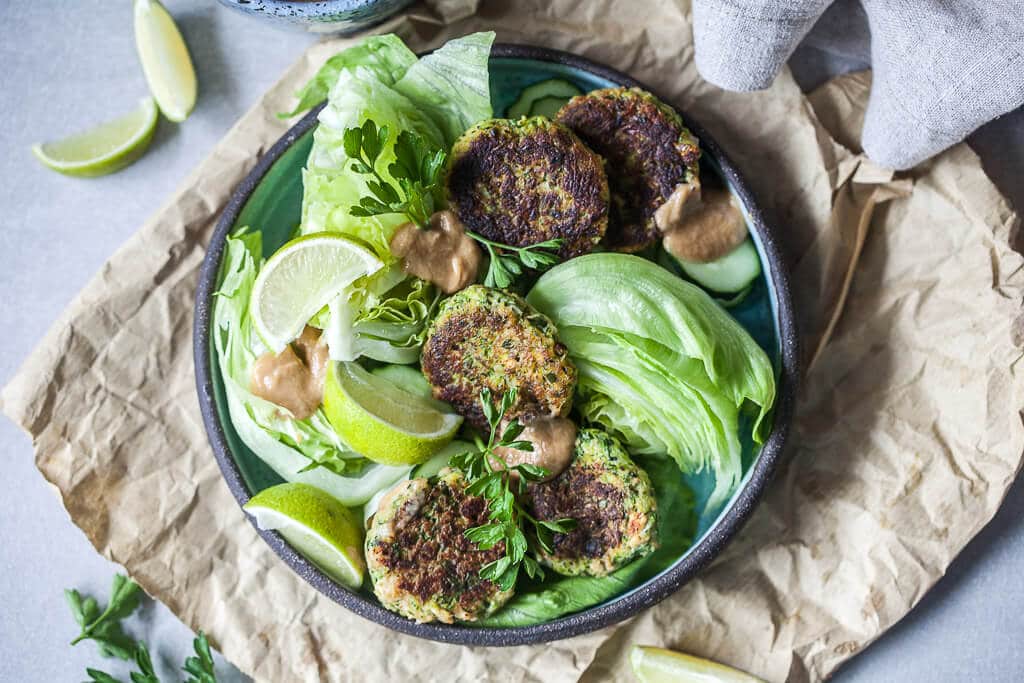 Tofu Zucchini Fritters with Peanut Sauce is the perfect way to use up all those zucchinis. | www.vibrantplate.com