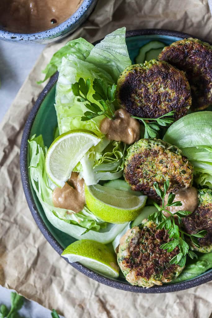 Tofu Zucchini Fritters with Peanut Sauce is the perfect way to use up all those zucchinis. | www.vibrantplate.com