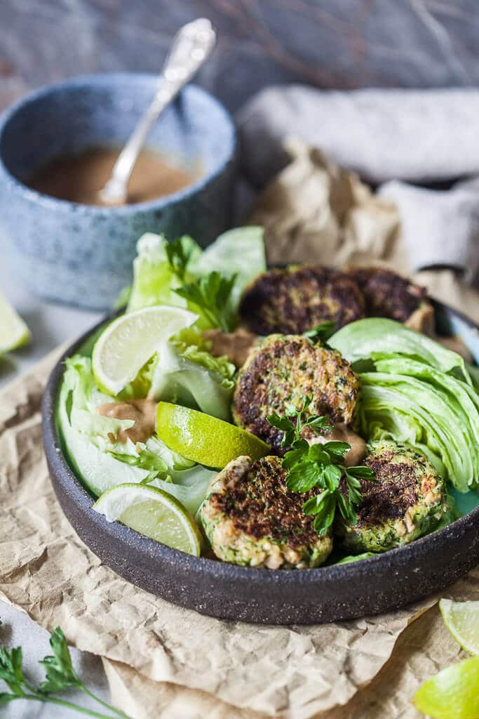 Tofu Zucchini Fritters with Peanut Sauce is the perfect way to use up all those zucchinis. | www.vibrantplate.com