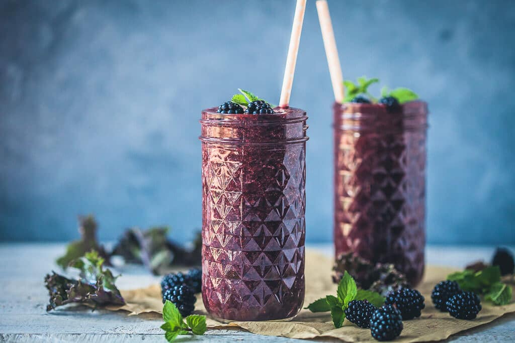 A Quick and Healthy drink, this Blackberry Kale Smoothie is packed full of vitamins and antioxidants, dairy-free and vegan! | www.vibrantplate.com