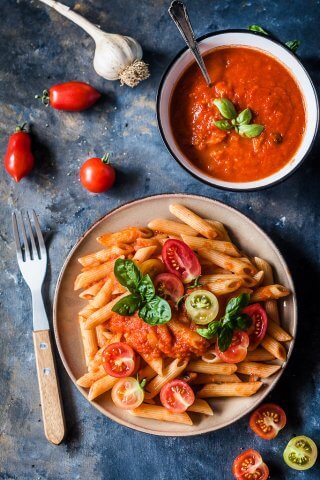 The recipe for this Dairy-Free and Vegan Pasta in Fresh Tomato Sauce is quick and easy, just perfect for a lazy summer day. | www.vibrantplate.com