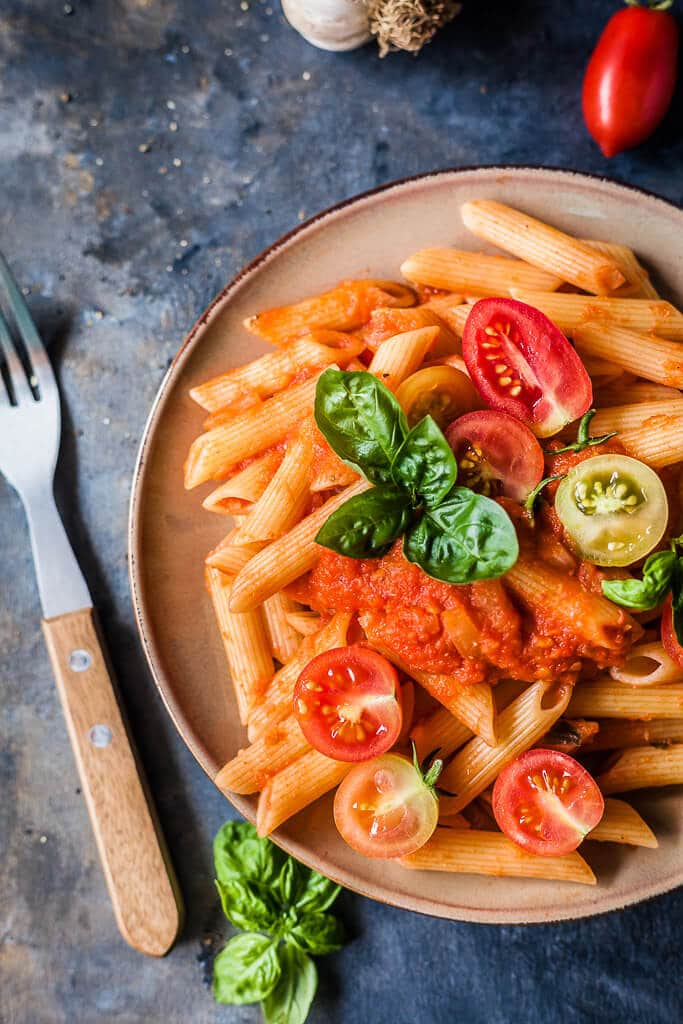 The recipe for this Dairy-Free and Vegan Pasta in Fresh Tomato Sauce is quick and easy, just perfect for a lazy summer day. | www.vibrantplate.com