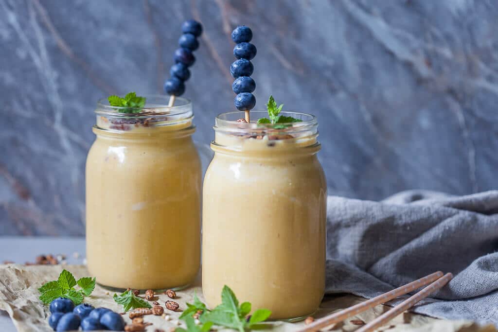 This Breakfast Oats Peach Smoothie is quick and easy to make. Perfect for a healthy summer breakfast! | www.vibrantplate.com