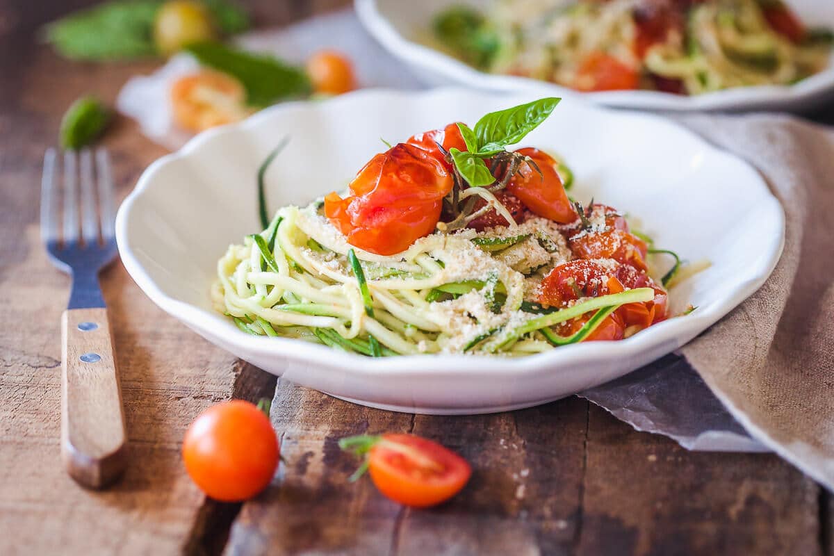 Cherry Tomato Zucchini Noodles are a light & delicious low-carb vegan meal with tons of flavor. | www.vibrantplate.com