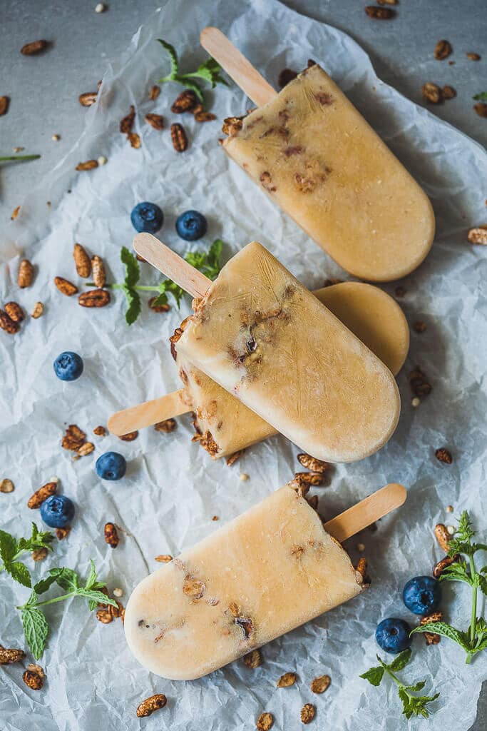 Vegan Peach Smoothie Popsicles are made from frozen leftover smoothie. An easy and delicious summer treat! | www.vibrantplate.com