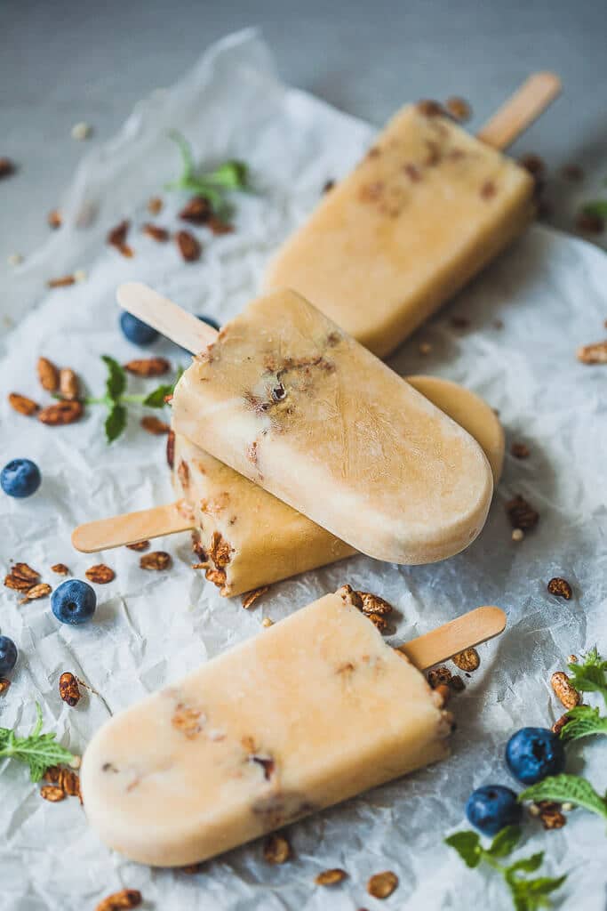 Vegan Peach Smoothie Popsicles are made from frozen leftover smoothie. An easy and delicious summer treat! | www.vibrantplate.com