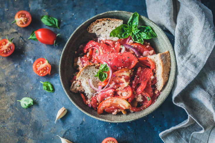 A delicious Bread and Tomato Salad, Panzanella is a great dish to use up stale bread and ripe tomatoes. | www.vibrantplate.com