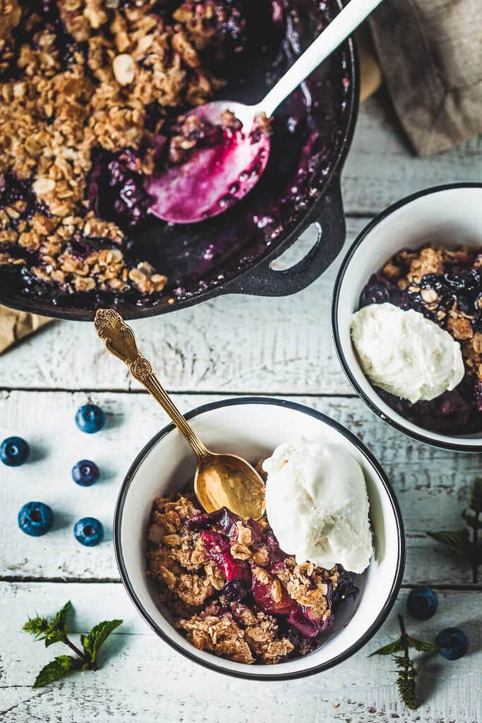 Crispy Berries and Plum Crumble is an easy and delicious vegan dessert that makes excellent use of fruit you have rolling around. | Vibrant Plate