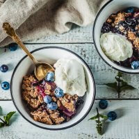 Crispy Berries and Plum Crumble is an easy and delicious vegan dessert that makes excellent use of fruit you have rolling around. | Vibrant Plate