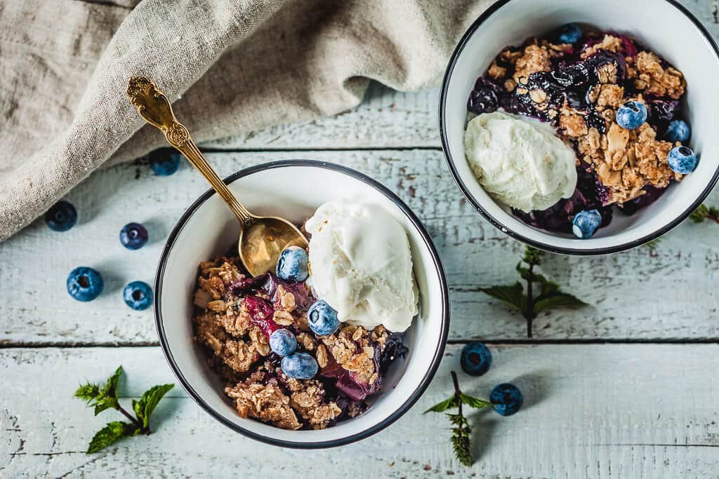 Crispy Berries and Plum Crumble is an easy and delicious vegan dessert that makes excellent use of fruit you have rolling around. | Vibrant Plate