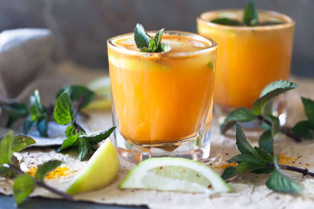 Yellow Glow Energizing Water with Turmeric, Ginger, Cinnamon, and Chili to help you boost your immune system. | Vibrant Plate