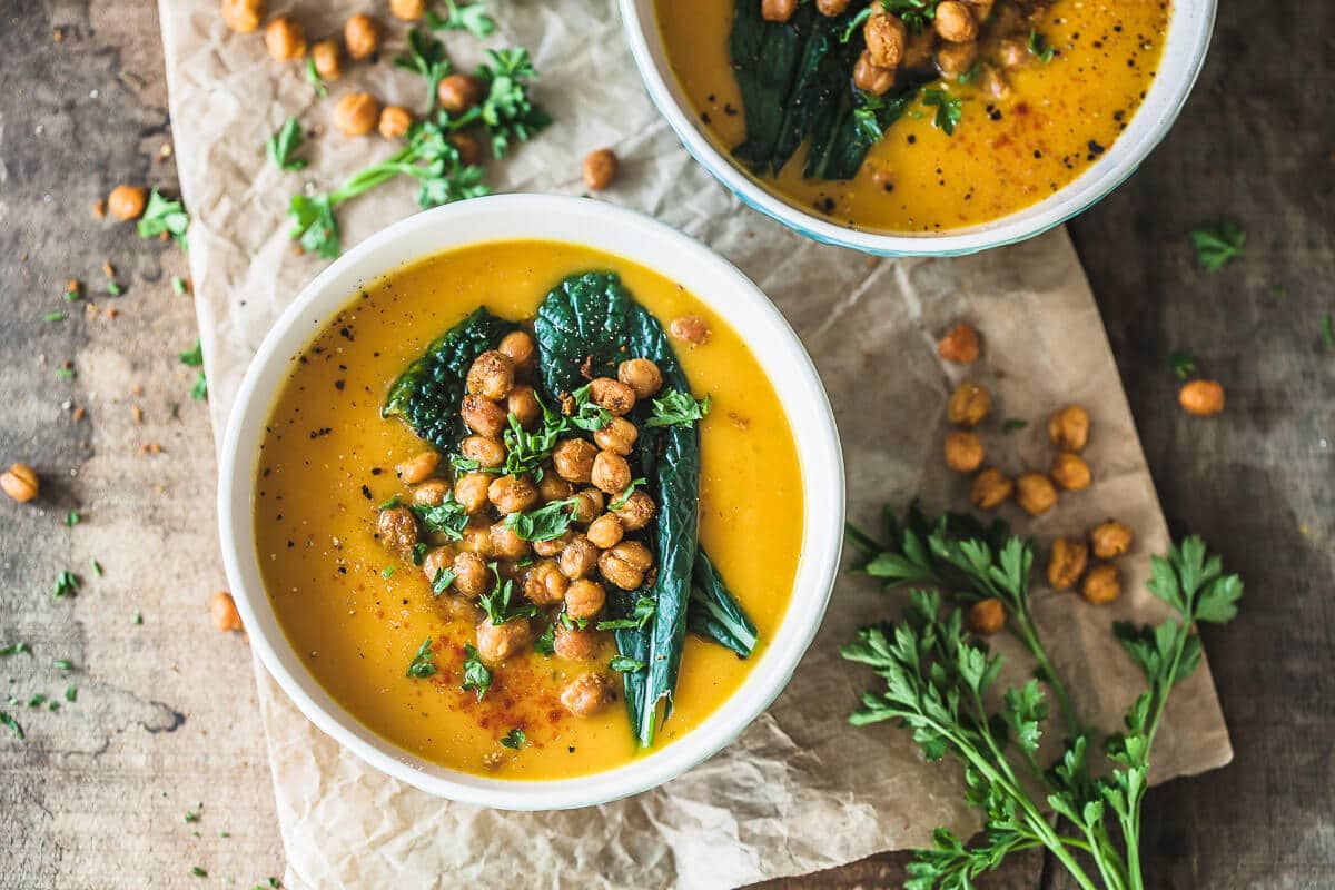 This Roasted Pumpkin Cream Soup Recipe is an easy winter soup, topped with Crispy Chickpeas. Vegan & Gluten-Free! | Vibrant Plate