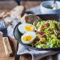 Not your standard salad, this Brussels Sprout Salad with Bacon and Eggs is a fresh take on the humble vegetable. | Vibrant Plate