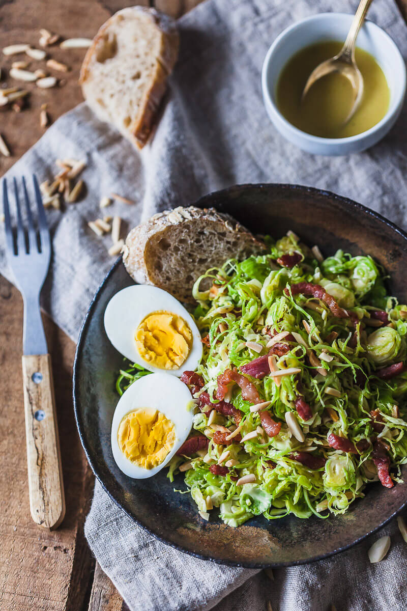 Not your standard salad, this Brussels Sprout Salad with Bacon and Eggs is a fresh take on the humble vegetable. | Vibrant Plate