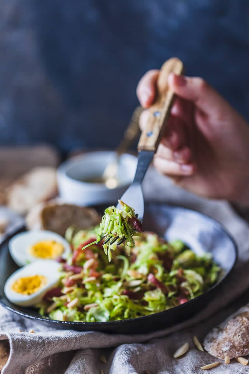 Not your standard salad, this Brussels Sprout Salad with Bacon and Eggs is a fresh take on the humble vegetable. | Vibrant Plate