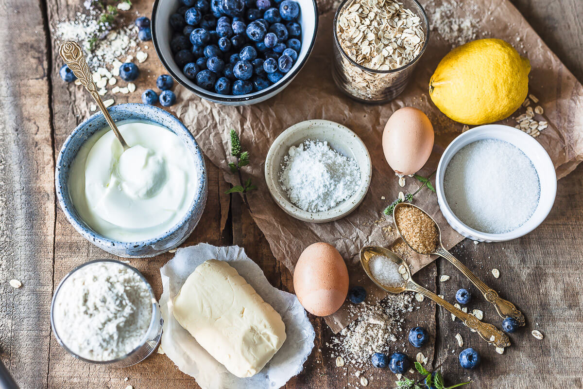 The perfect Yogurt Blueberry Breakfast Muffins, tender and fluffy in the middle, crisp and crunchy on top. | Vibrant Plate