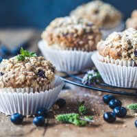 The perfect Yogurt Blueberry Breakfast Muffins, tender and fluffy in the middle, crisp and crunchy on top. | Vibrant Plate