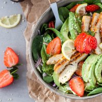 A beautiful spring Strawberry Spinach Salad with Grilled Chicken and Avocado for a healthy and filling meal! | Vibrant Plate